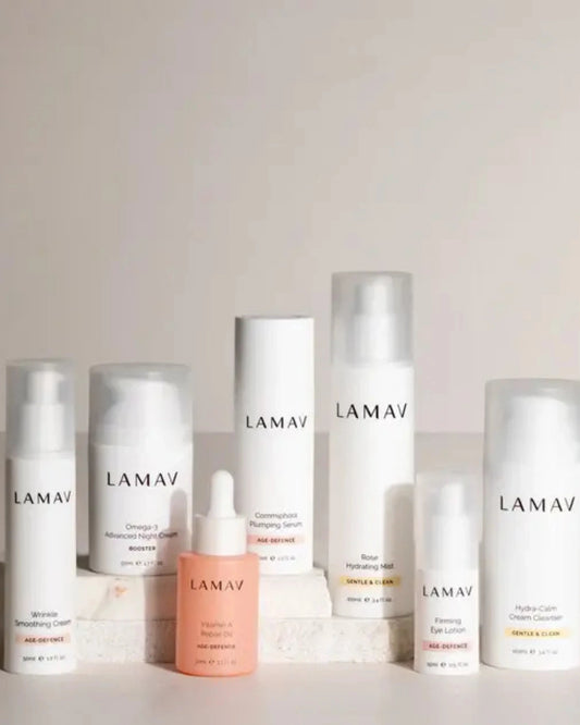 Age-Defence Complete Collection by LAMAV — 7 skincare items displayed on marble blocks | Reduce fine lines and soothe skin