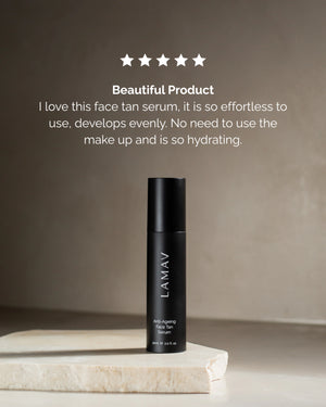 Anti-Ageing Face Tan Serum by LAMAV — bottle on a stone slab with a 5-star review | Hydrates and develops evenly