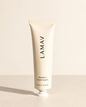 LAMAV Vitamin C Hand Cream 60ml tube on a beige surface