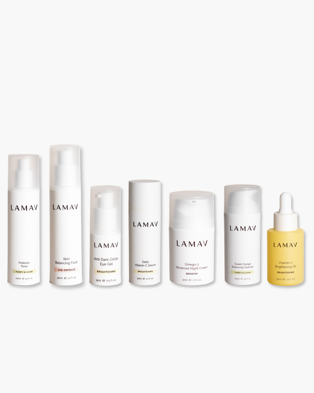 Age-Defence Collection by LAMAV — 7 products lined up on a smooth rounded stone | Control shine and smooth fine lines