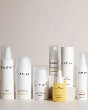 Age-Defence Collection by LAMAV — 7 skincare bottles standing on white stepped blocks | Purify and clear your complexion