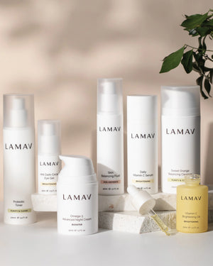 Age-Defence Collection by LAMAV — 7 bottles on staggered stone blocks with leaves | Balance oily and combination skin