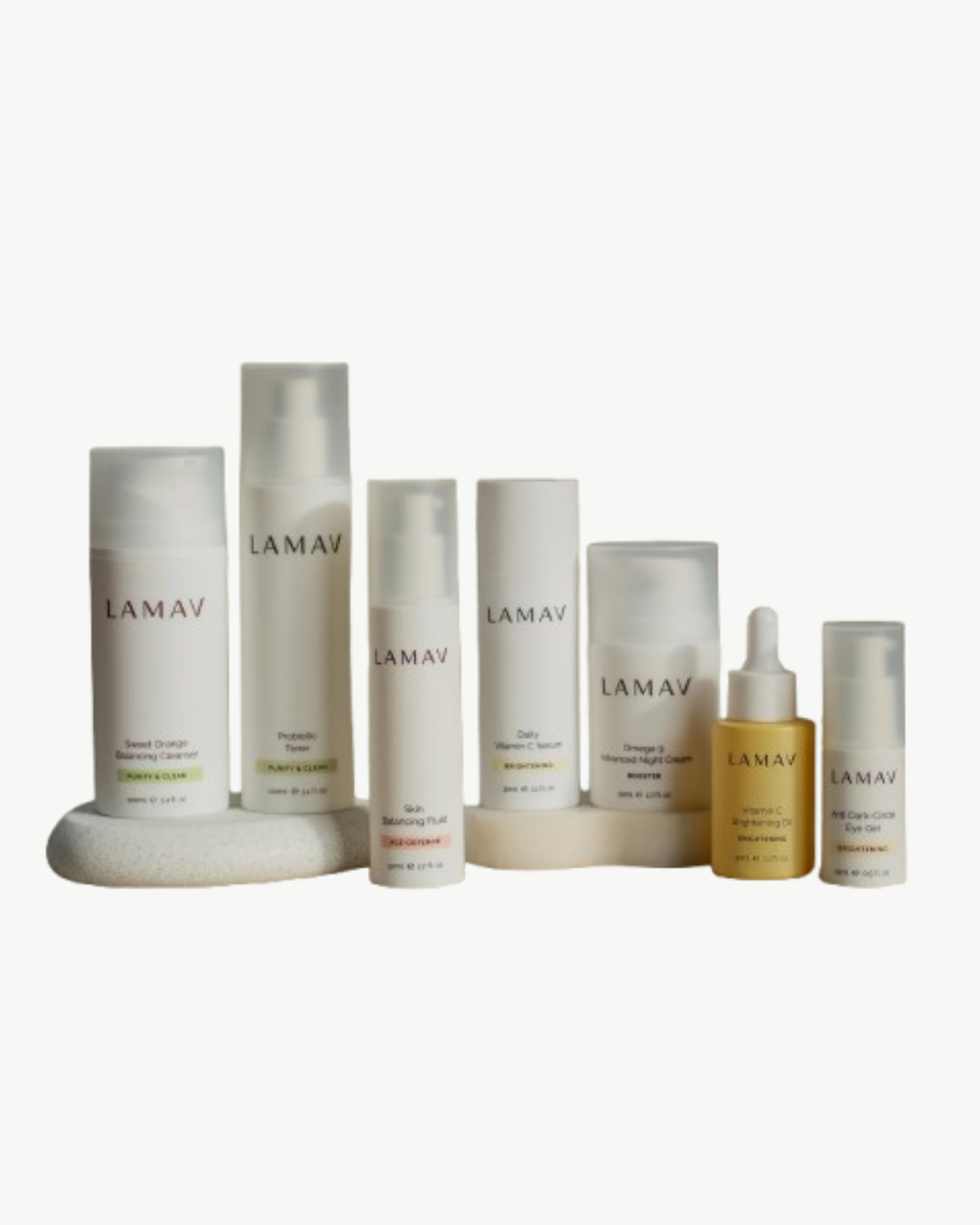 Age Defence Complete Skincare Collection by LAMAV — seven bottles on white stone bases | Balances oil and fights aging