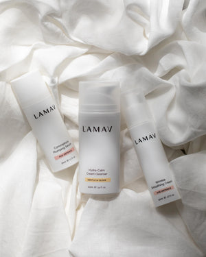 Age-Defence Essentials by LAMAV — 3 bottles resting on crumpled white linen | Soothe and hydrate aging skin