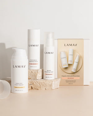 Age-Defence Essentials by LAMAV — 3 bottles next to packaging box on stone blocks | Complete organic regimen