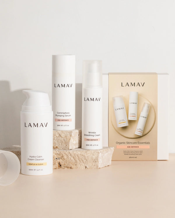 Age-Defence Essentials by LAMAV — 3 bottles next to packaging box on stone blocks | Complete organic regimen