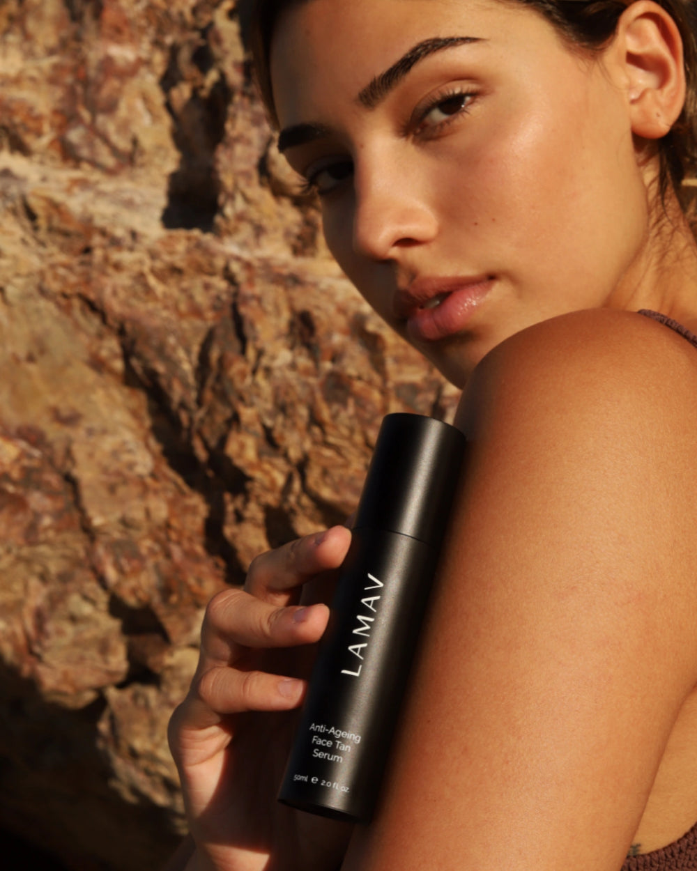 Anti-Ageing Face Tan Serum by LAMAV — bottle next to three beauty awards | Award-winning sunless tan