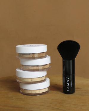 Anti-Ageing Mineral Foundation SPF15 by LAMAV — stacked jars next to a black kabuki brush | Effortless blending and coverage