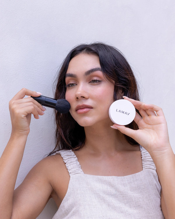 Anti-Ageing Mineral Foundation SPF15 by LAMAV — woman applying powder with a brush | Easy and seamless application