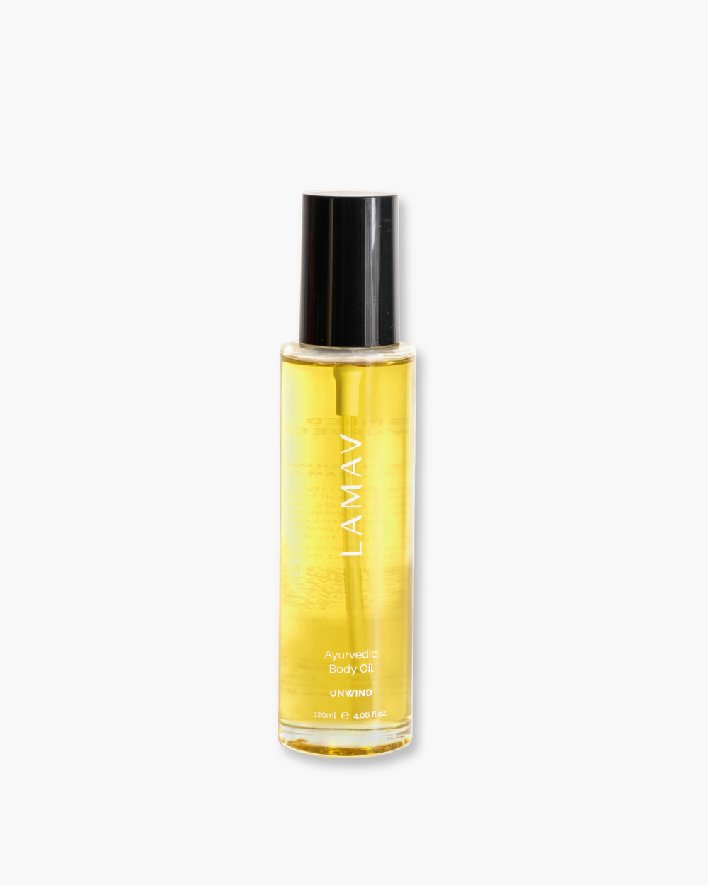 Ayurvedic Body Oil Unwind by LAMAV — yellow bottle next to a bronze beauty award | Relaxes the mind and nourishes skin