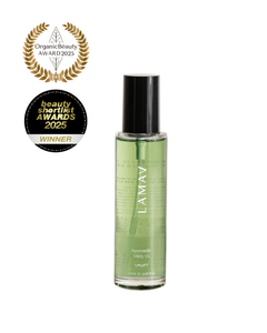 Ayurvedic Body Oil Uplift by LAMAV — green bottle next to two beauty awards | Award-winning skin nourishment