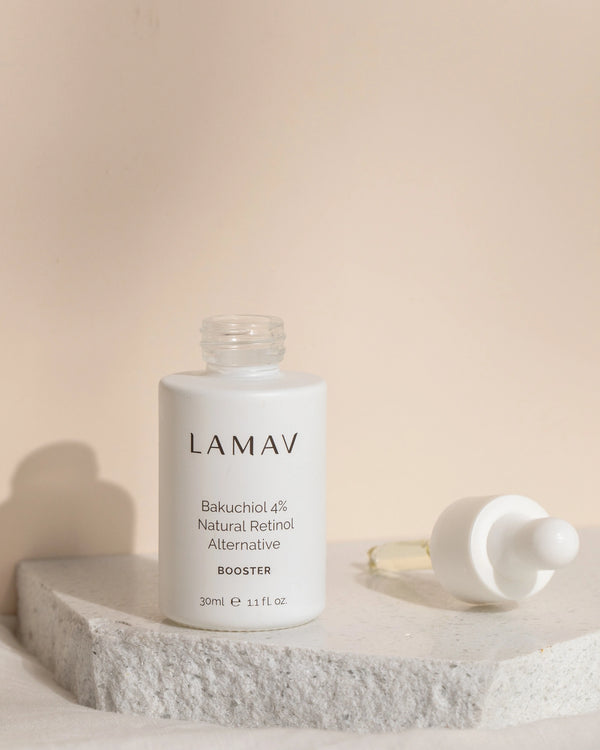 Bakuchiol 4% Natural Retinol Alternative by LAMAV — open bottle and dropper on a speckled stone | Smooths fine lines
