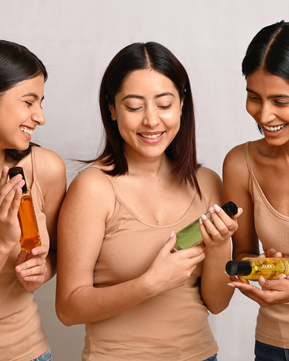 Body Oil Trio by LAMAV — three glass bottles standing in a row | Complete collection for daily nourishment
