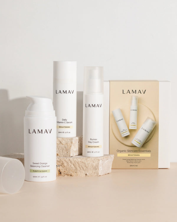 Brightening Essentials by LAMAV — three bottles standing next to the open gift box | complete radiant skin routine