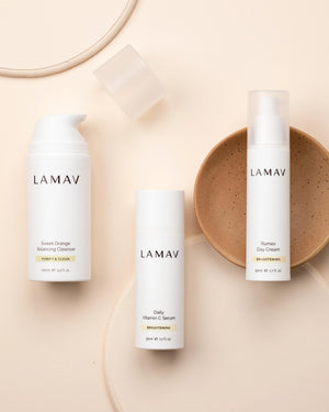 Brightening Essentials Set by LAMAV — bottles standing upright next to a brown ceramic dish | Purify and hydrate daily