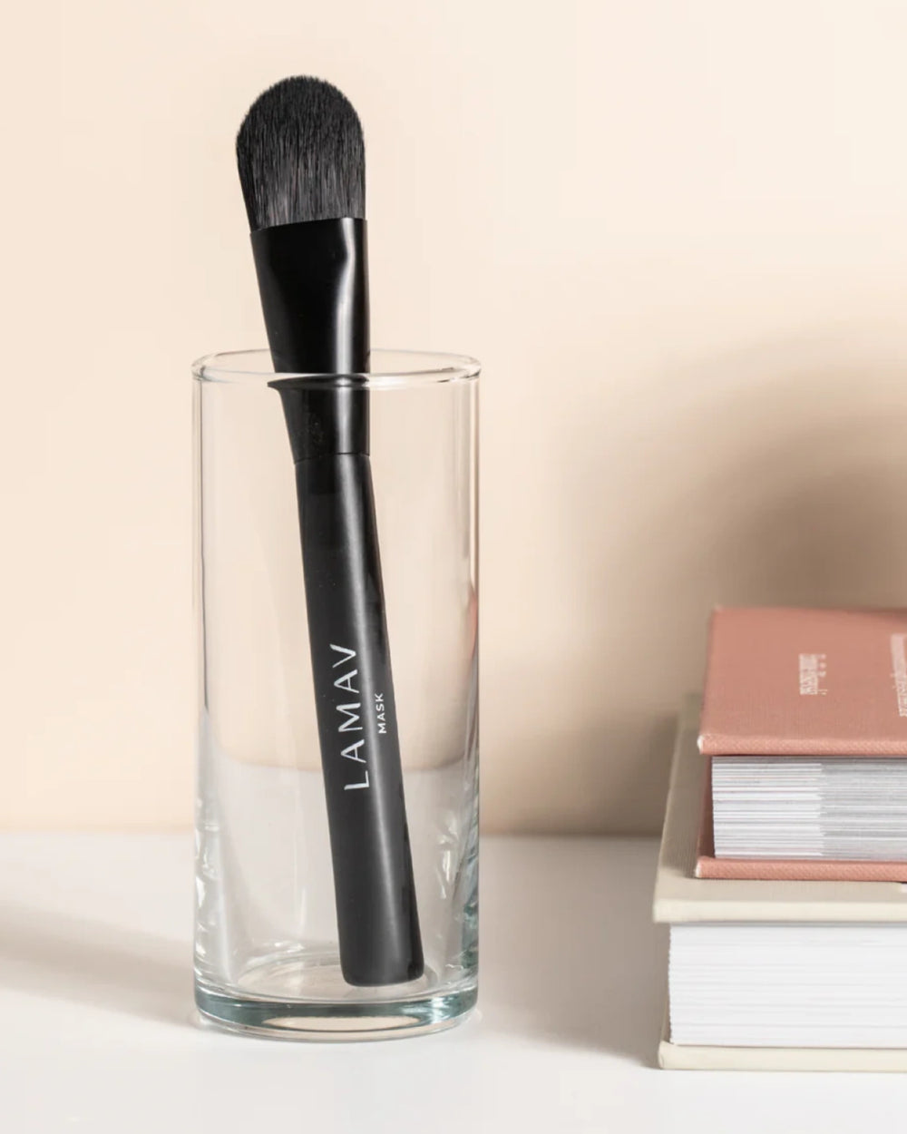 Brightening Mask Bundle by LAMAV — mask application brush next to a yellow tube | restores radiant glowing skin