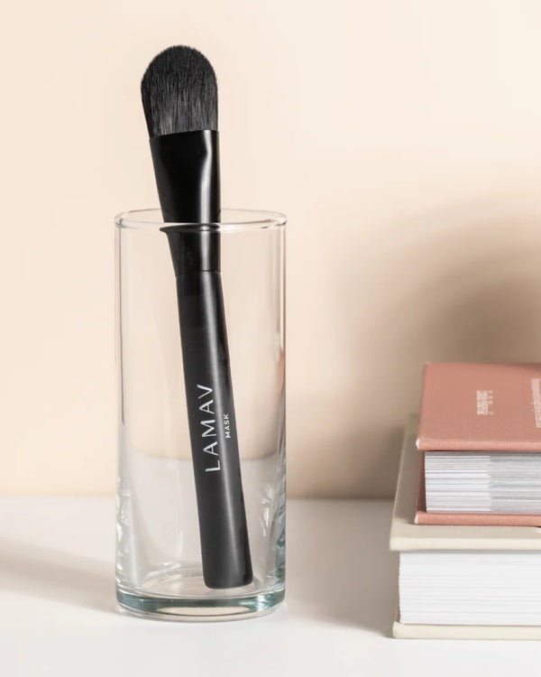 Brightening Mask Bundle by LAMAV — black mask brush standing in a clear glass | Smooth and precise application
