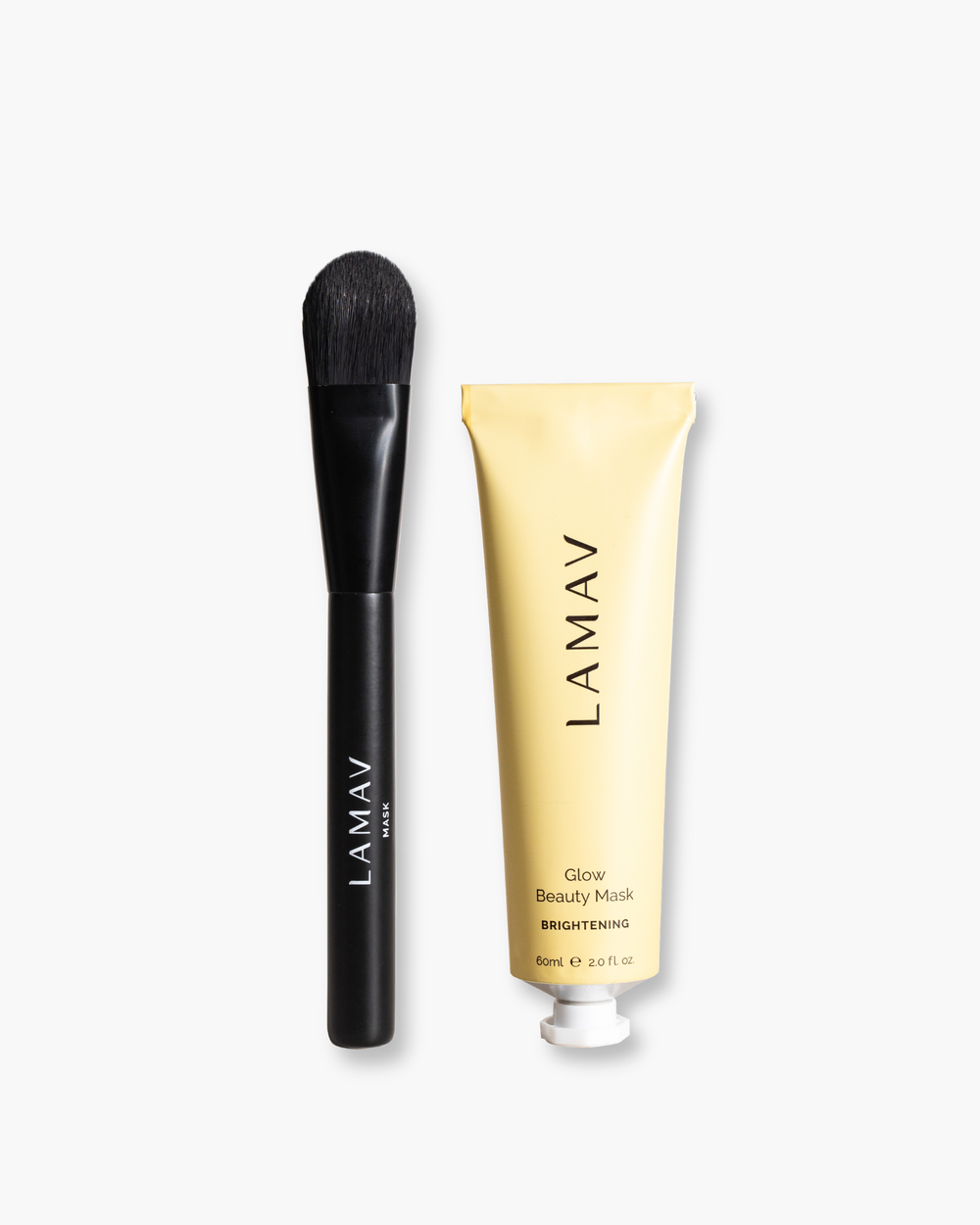 Brightening Mask Bundle by LAMAV — mask application brush next to a yellow tube | restores radiant glowing skin