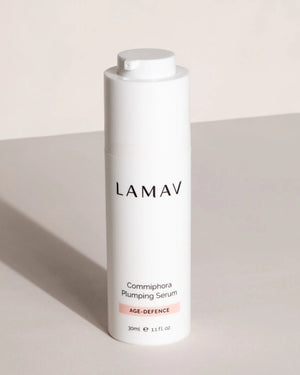 Commiphora Plumping Serum by LAMAV — 30ml pump bottle on a minimal beige surface | Natural age-defence skincare