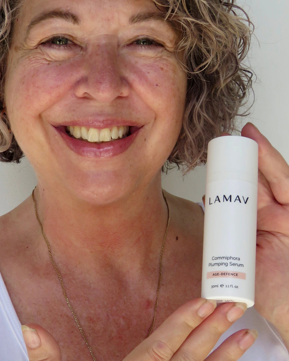 Commiphora Plumping Serum by LAMAV — white bottle with an organic beauty award badge | plumps and firms skin