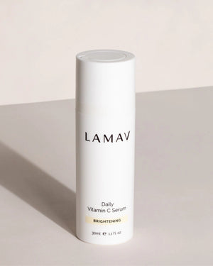 Daily Vitamin C Serum by LAMAV — 30ml white pump bottle on a beige surface | Promotes collagen production