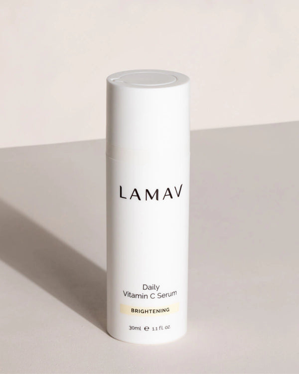 Daily Vitamin C Serum by LAMAV — 30ml white pump bottle on a beige surface | Promotes collagen production
