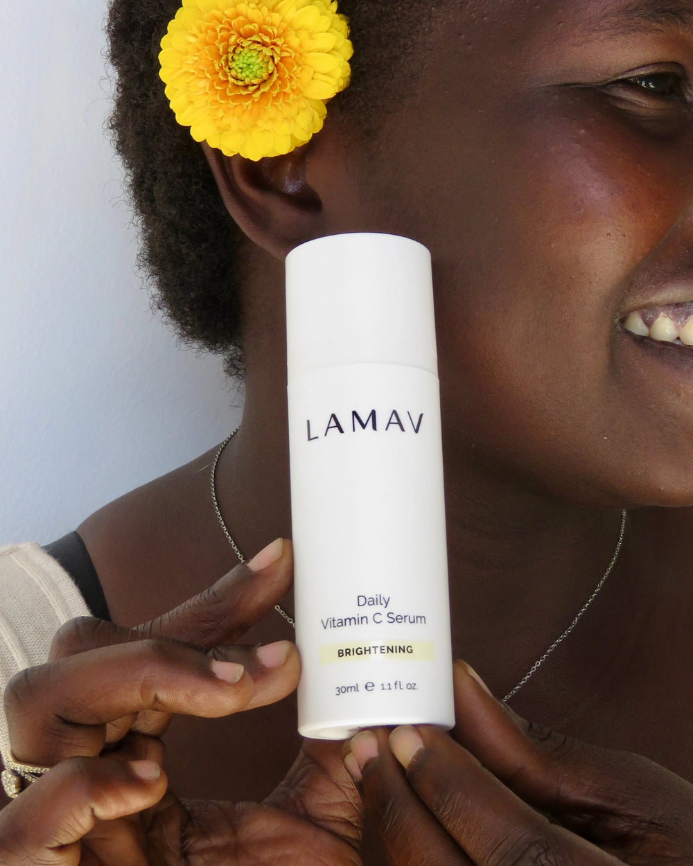 Daily Vitamin C Serum by LAMAV — white bottle with three beauty award badges | brightens and evens skin tone