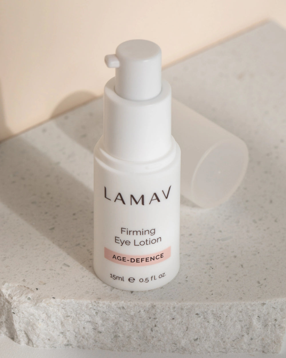 Firming Eye Lotion by LAMAV — white bottle with clean and non-toxic award badges | tightens and lifts eye area