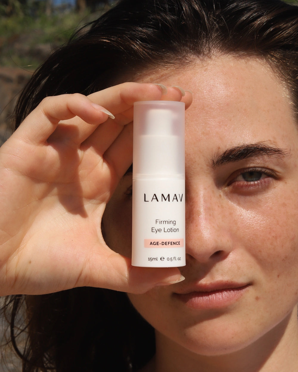 Firming Eye Lotion by LAMAV — white bottle with clean and non-toxic award badges | tightens and lifts eye area