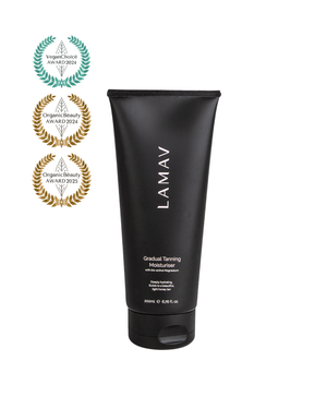 Gradual Tanning Moisturiser Light by LAMAV — 200ml black tube beside multiple beauty awards | builds a natural honey tan