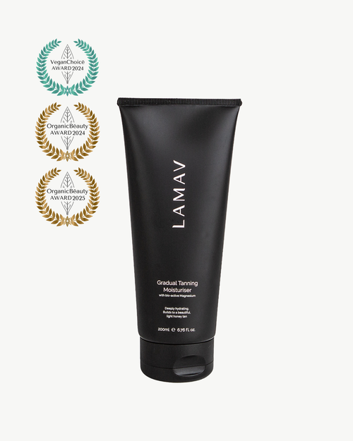 Gradual Tanning Moisturiser Light by LAMAV — 200ml black tube beside multiple beauty awards | builds a natural honey tan