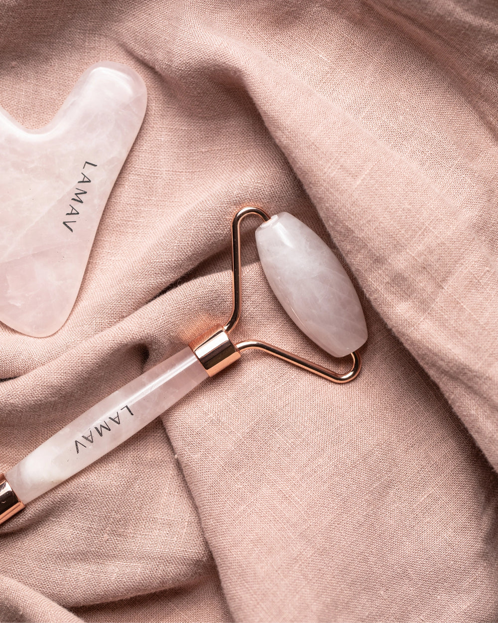 Gua Sha and Roller by LAMAV — rose quartz tools with winner badges | award-winning beauty tools