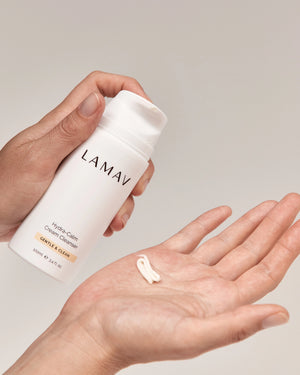 Hydra-Calm Cream Cleanser by LAMAV — Hands dispensing cream from 100ml bottle | Gentle hydrating cleanse