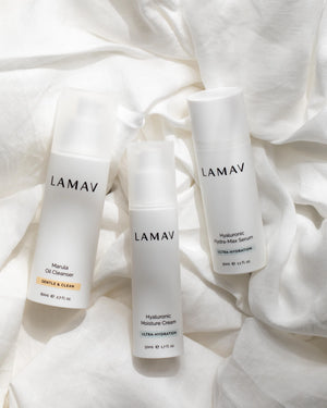 Hydration Organic Skincare Essentials by LAMAV — Three white bottles resting on soft linen | Gentle organic hydration