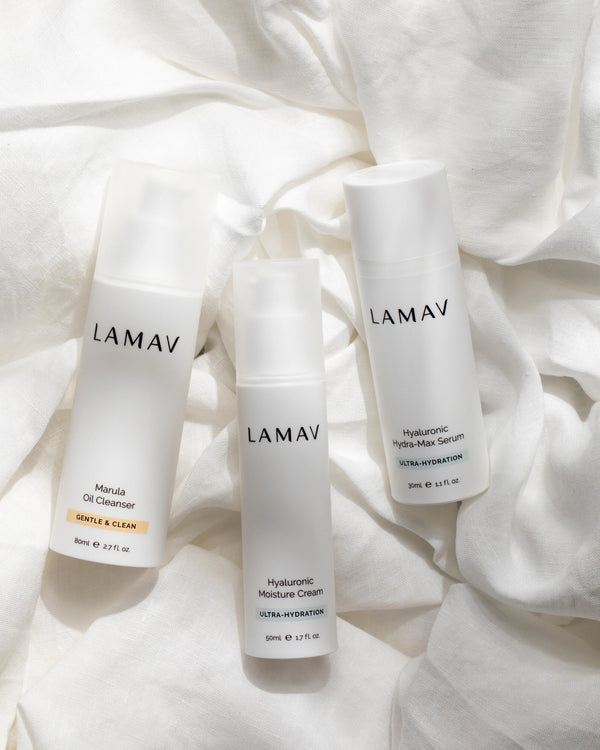 Hydration Organic Skincare Essentials by LAMAV — Three white bottles resting on soft linen | Gentle organic hydration