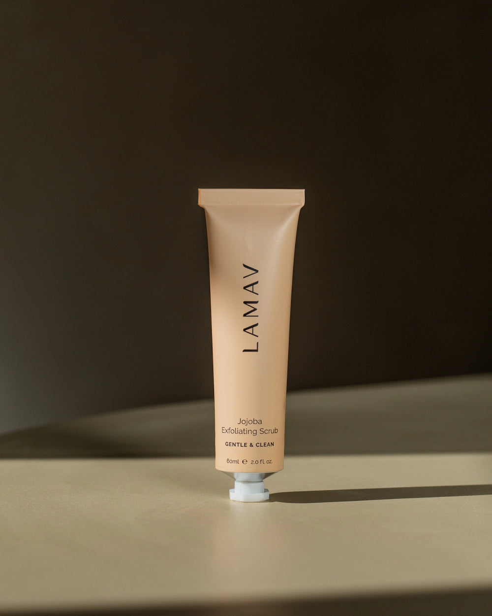 Jojoba Exfoliating Scrub by LAMAV — 60ml soft peach tube, gentle and clean, front view | smooths and refines skin texture