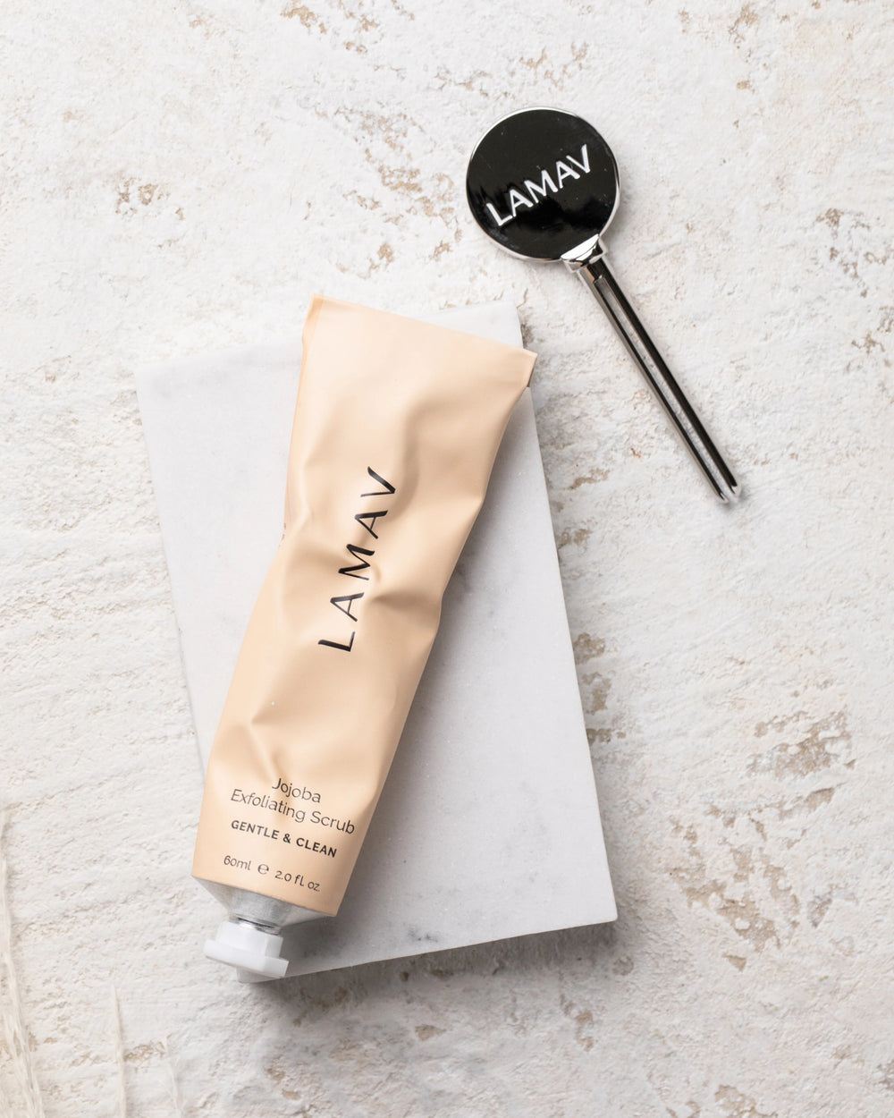Jojoba Exfoliating Scrub by LAMAV — 60ml soft peach tube, gentle and clean, front view | smooths and refines skin texture