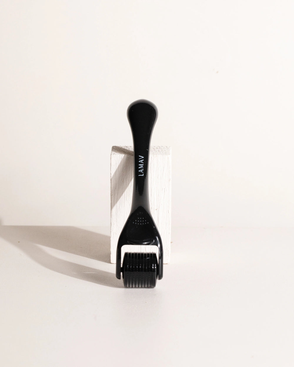 Micro Dermal Roller by LAMAV — black microneedling tool beside an Organic Beauty Award 2025 badge | skin rejuvenation