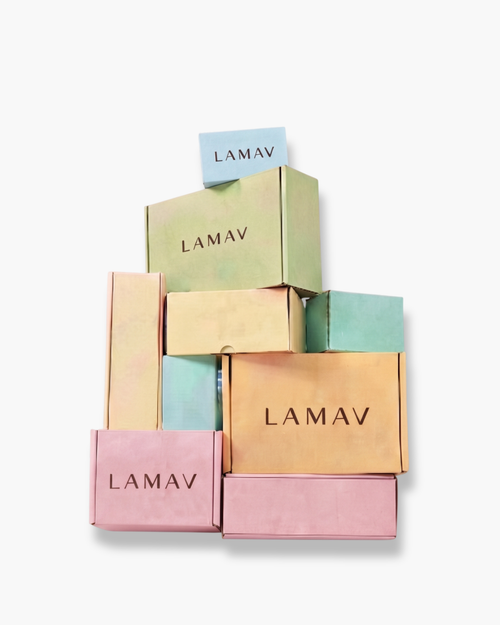 Mystery Box by LAMAV — a stack of colorful branded skincare boxes on a white background | surprise organic beauty bundle