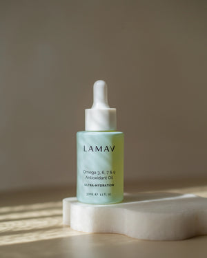Omega 3, 6, 7 & 9 Antioxidant Oil by LAMAV — 30ml bottle on marble | ultra-hydration