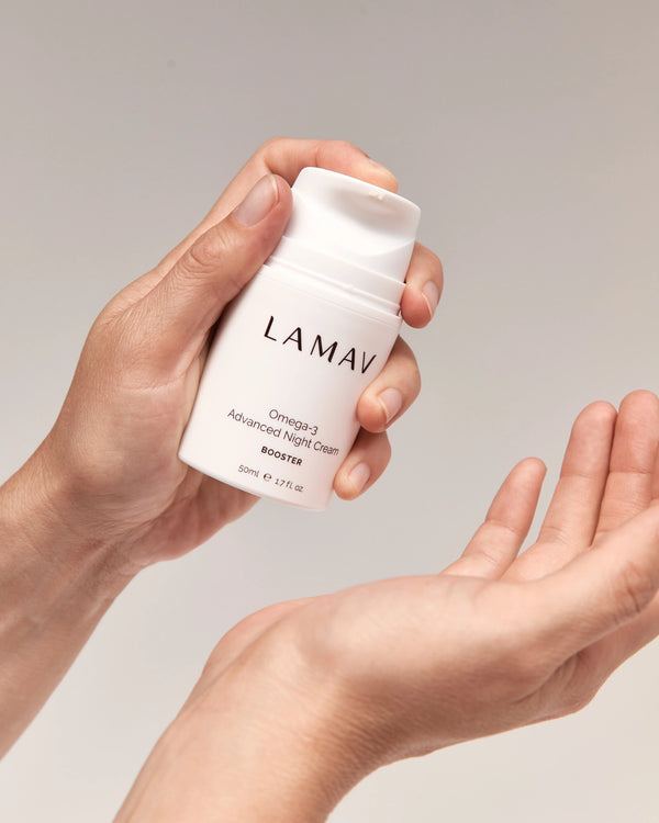 Omega-3 Advanced Night Cream by LAMAV — hands preparing to pump cream | skin renewal