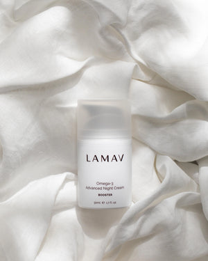 Omega-3 Advanced Night Cream by LAMAV — bottle resting on white linen | skin rejuvenation