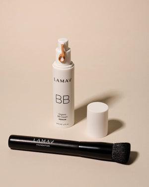 Organic BB Cream by LAMAV — Medium shade bottle with open pump and foundation brush | smooth application