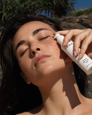 Organic BB Cream by LAMAV — model close-up applying product | light buildable coverage