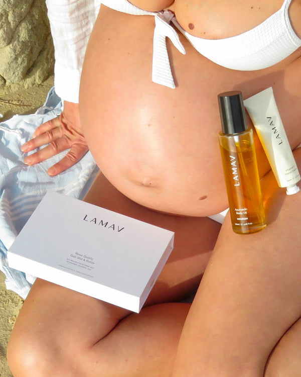 Pregnancy Pamper Pack by LAMAV — body oil and hand cream next to pregnant belly | nourishing organic care