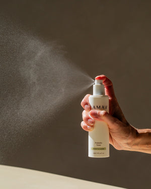 Probiotic Toner by LAMAV — hand spraying fine mist from bottle | instant hydration boost