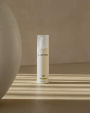 Probiotic Toner by LAMAV — bottle standing in warm sunlight | calming facial mist