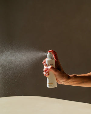 Rose Hydrating Mist by LAMAV — hand spraying mist catching light | instant skin hydration