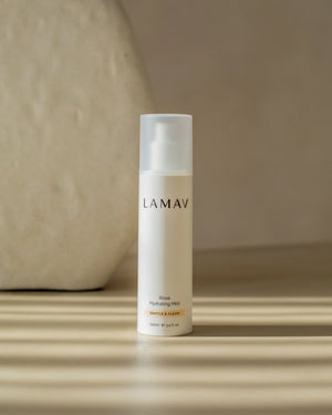 Rose Hydrating Mist by LAMAV — bottle standing in striped shadows | daily refreshing tone