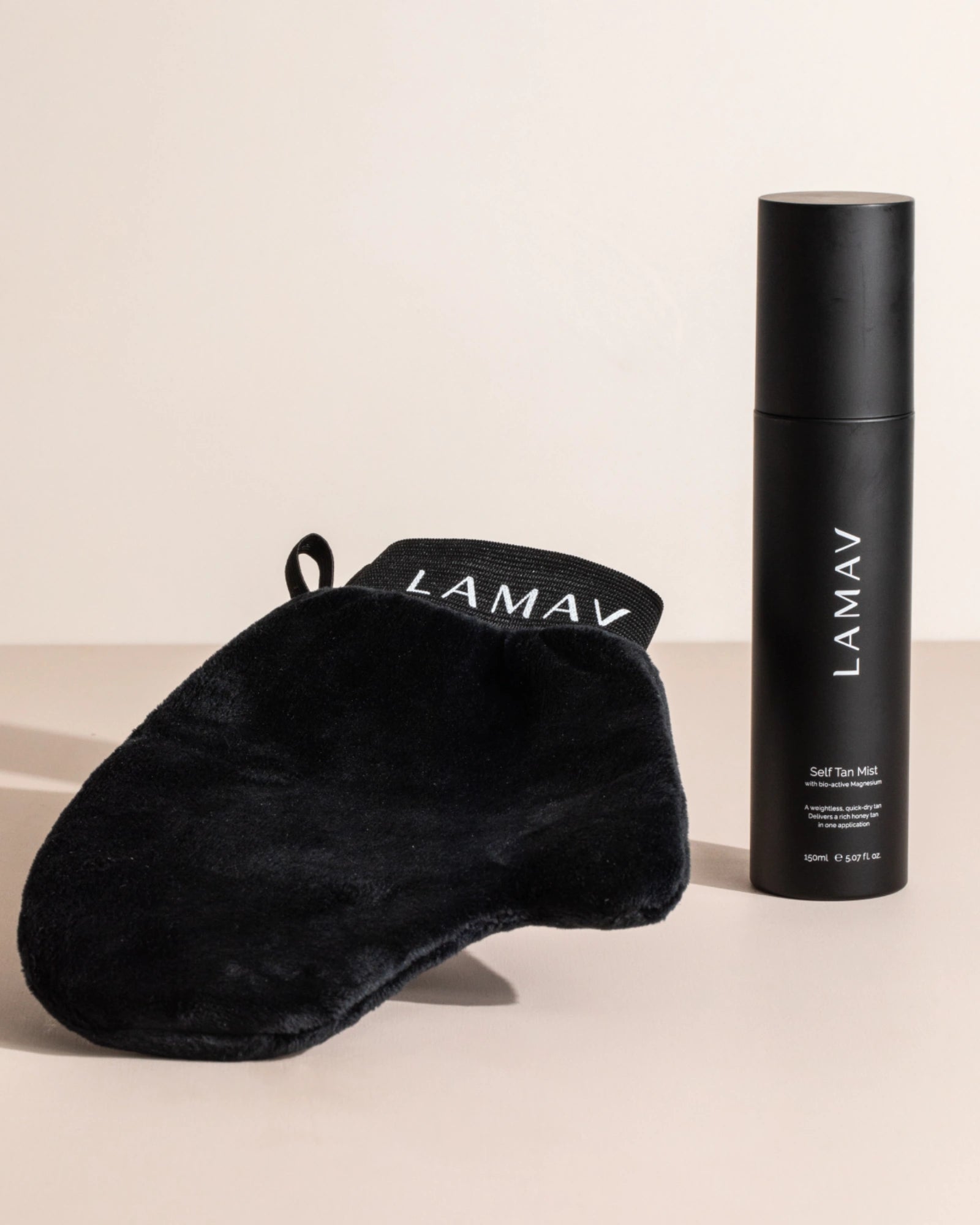 Self Tan Mist by LAMAV — black mist bottle and a black tanning mitt | fast-drying streak-free tan